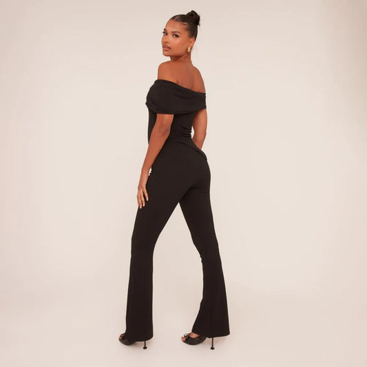 Asymmetric Bardot Flared Jumpsuit In Black Slinky