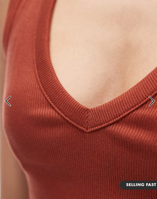 ASOS DESIGN ribbed v neck vest in rust