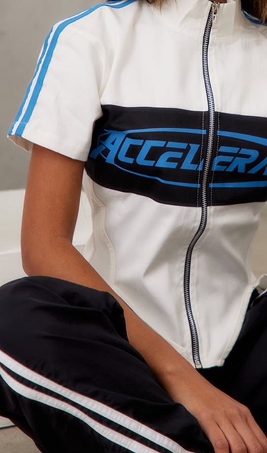 white motocross high neck twill short sleeve zip through top