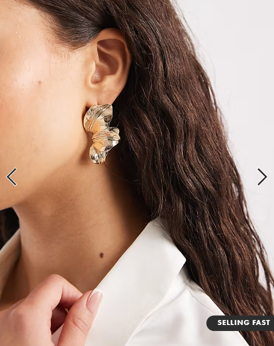 ASOS DESIGN stud earrings with half-petal design in gold tone