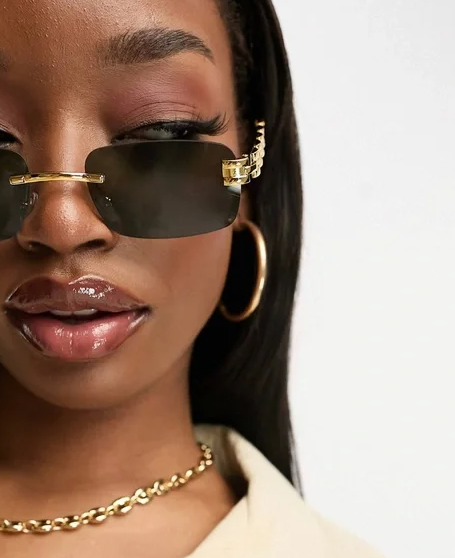 90s rimless chain temple detail sunlgasses in dark