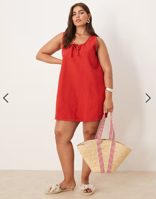ASOS DESIGN Curve denim scoop mini dress with bow front in red