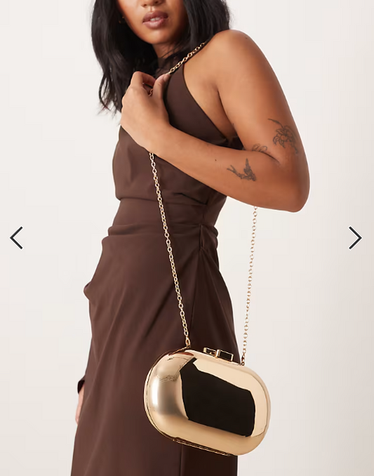 True Decadence oval hard clutch bag in gold