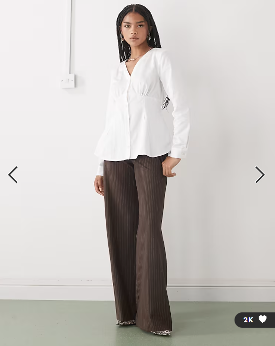 Reclaimed Vintage cinched in shirt with seam details and peplum hem in white