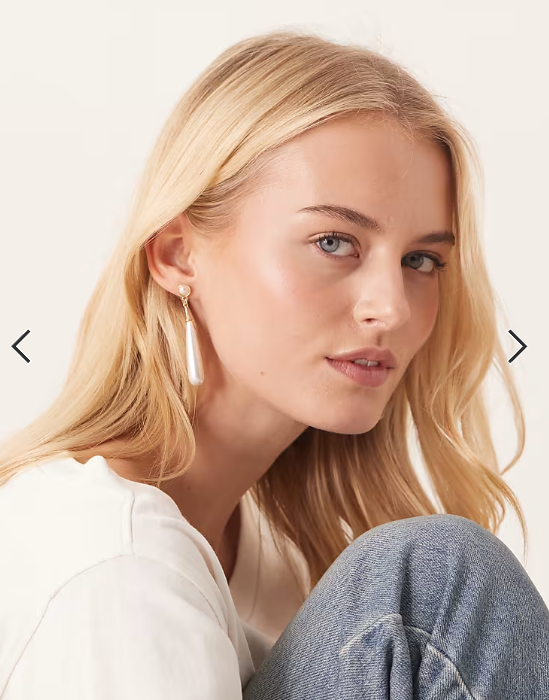 True Decadence long pearl drop earrings in gold