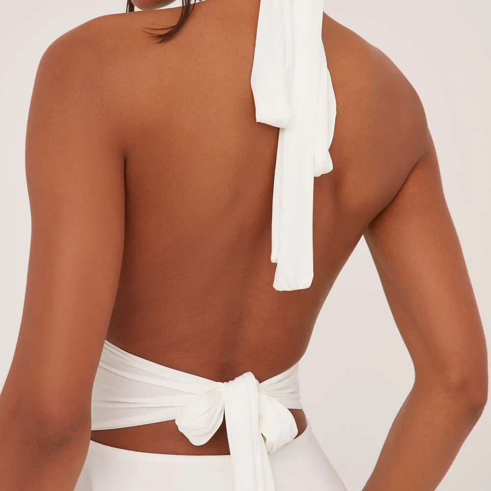 Plunge Halterneck Open Back Flippy Hem Mini Skater Dress In White Slinky