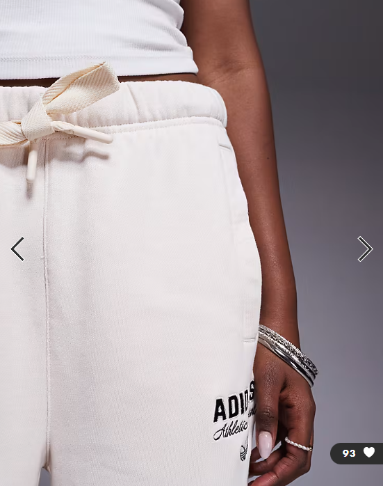 adidas Originals joggers in cream with front graphic