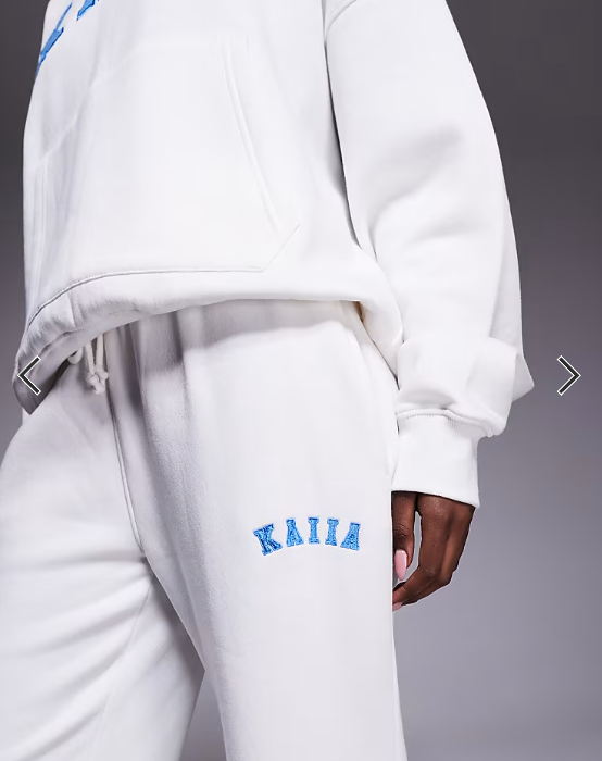 Kaiia cotton rich embroidered logo wide leg sweatpants in white and blue