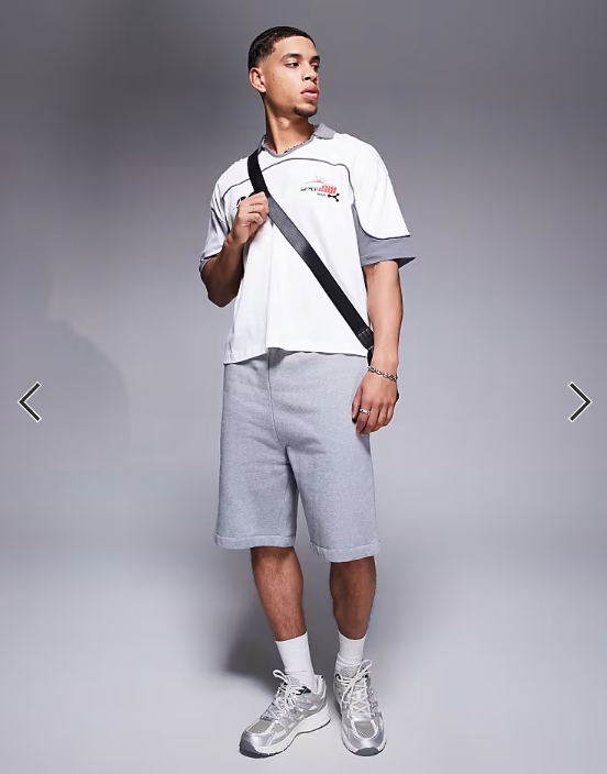 ASOS DESIGN boxy short sleeve polo with with city print in brown.
