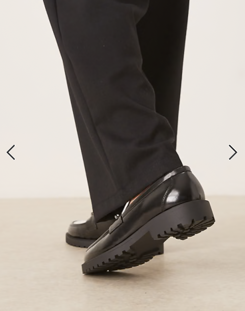 ASOS DESIGN loafers in black and white with gold snaffle on cleated sole
