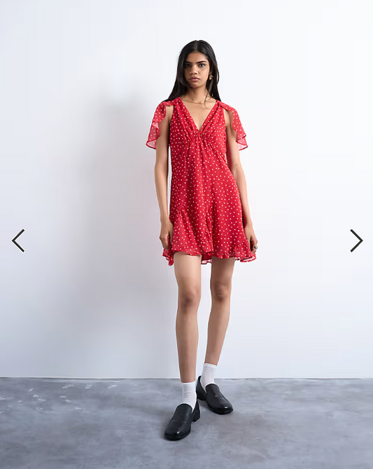 Topshop cape sleeve godet hem mini dress in red based spot