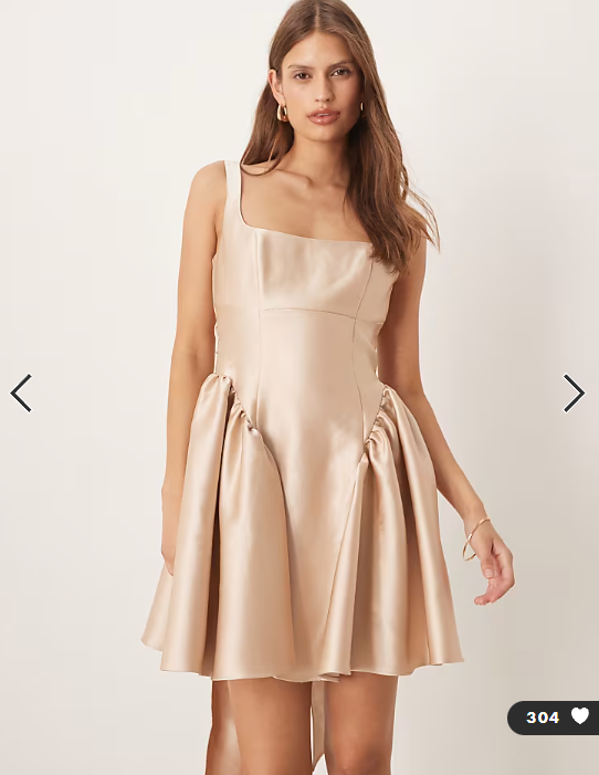 Six Stories drop hem bow back mini dress in soft gold