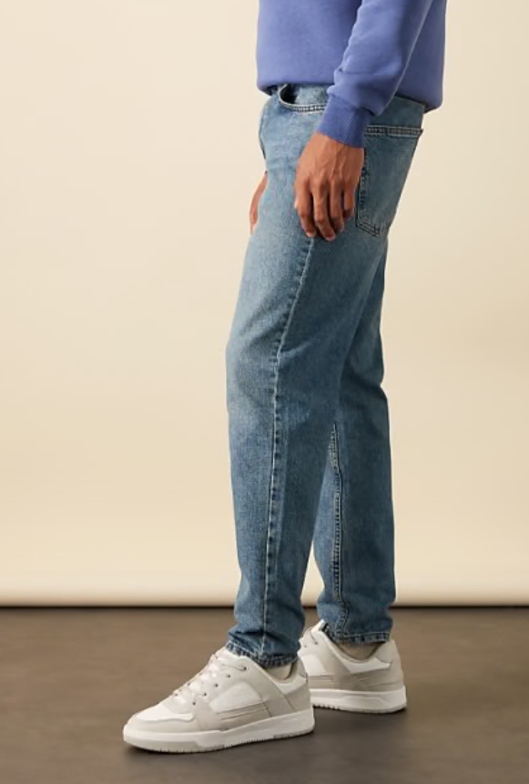 ASOS DESIGN tapered fit jeans in mid wash blue