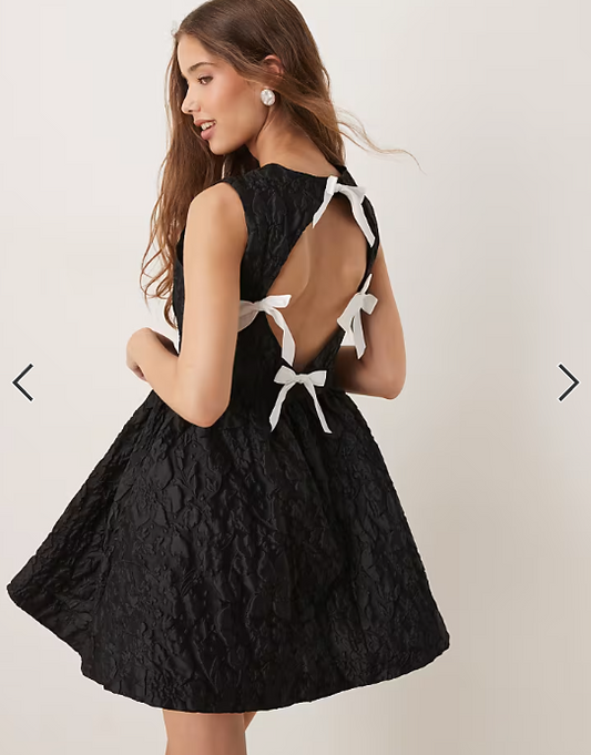 Sister Jane structured jacquard mini dress with pockets