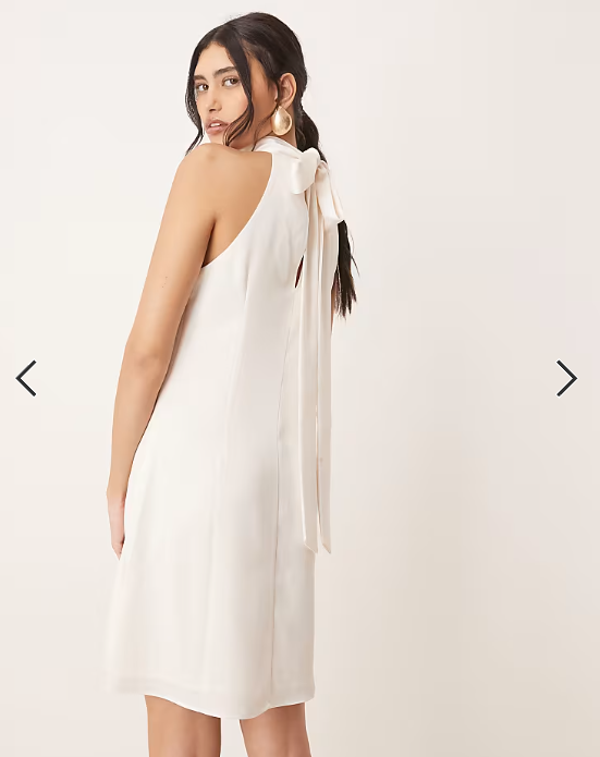 YAS halterneck mini dress with bow back in white