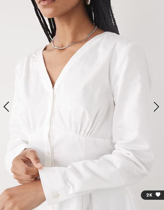 Reclaimed Vintage cinched in shirt with seam details and peplum hem in white