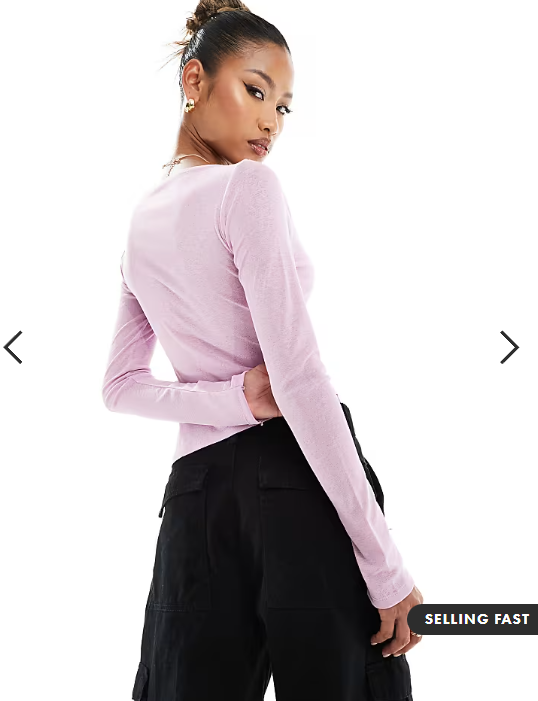 ASOS DESIGN sheer long sleeve top with asymmetric hem in pink