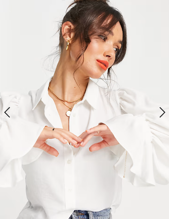 ASOS DESIGN volume sleeved soft shirt with ruffle cuffs in ivory