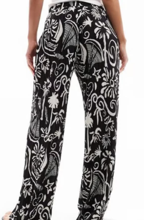 Vero Moda high waist wide leg plisse trouser in tropical conversational print