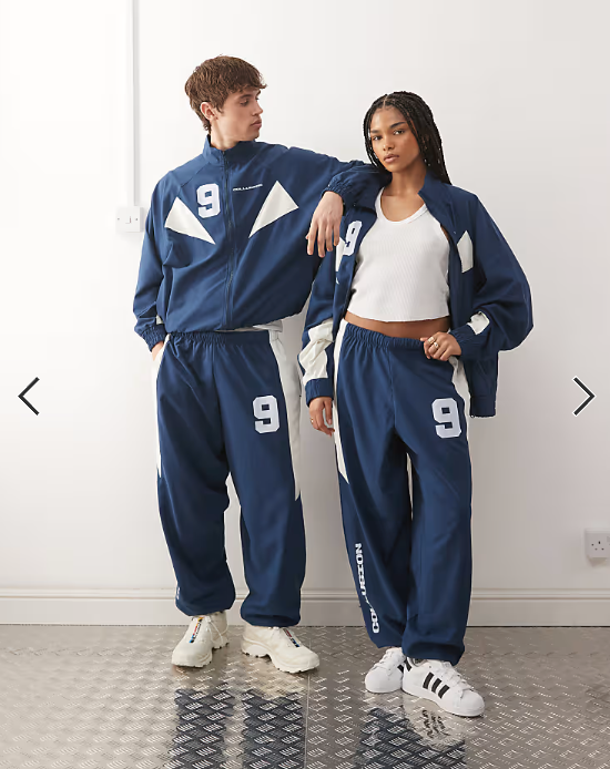 COLLUSION Unisex nylon panelled tracksuit co-ord in blue