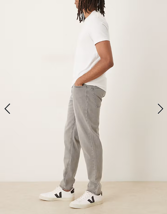ASOS DESIGN tapered jeans in washed grey