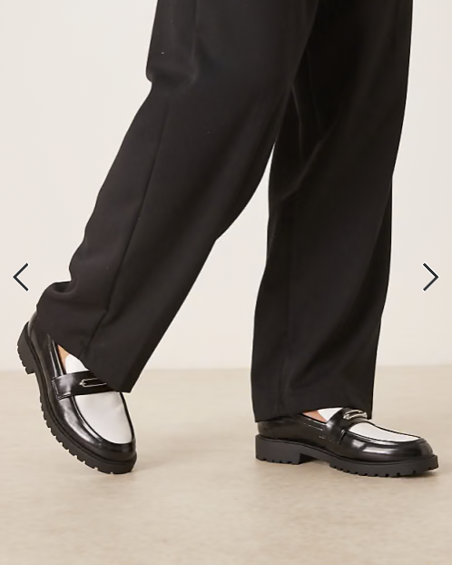ASOS DESIGN loafers in black and white with gold snaffle on cleated sole