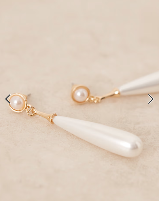 True Decadence long pearl drop earrings in gold