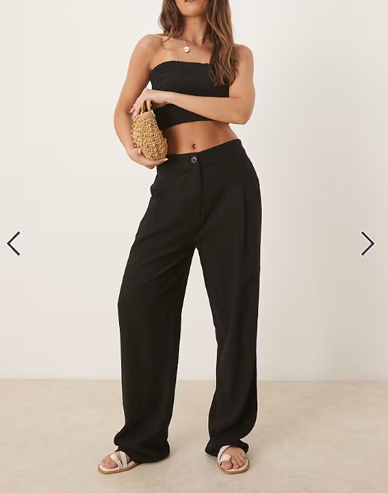 ASOS DESIGN pleat front tapered pants with linen in black