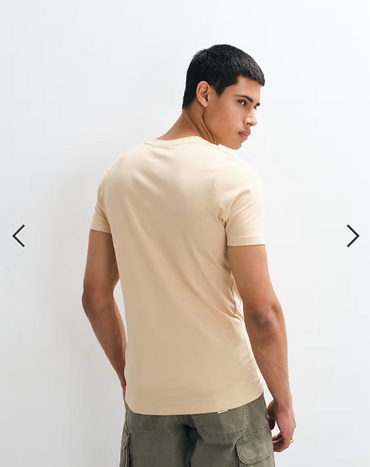 Jack & Jones muscle fit T-shirt in beige.
