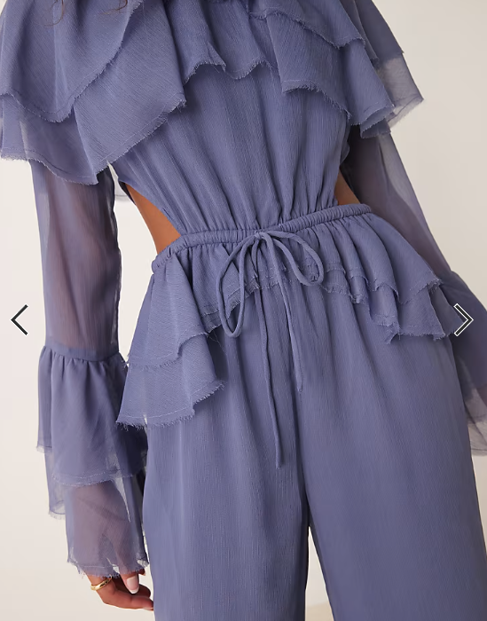 ASOS DESIGN exaggerated ruffle sleeve jumpsuit with cut out waist in blue