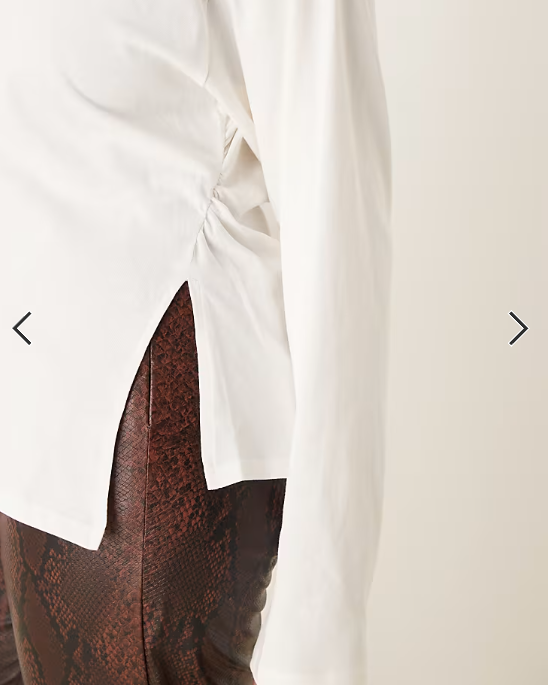 ASOS DESIGN Curve cinched waist asymmetric hem long sleeve tee in cream