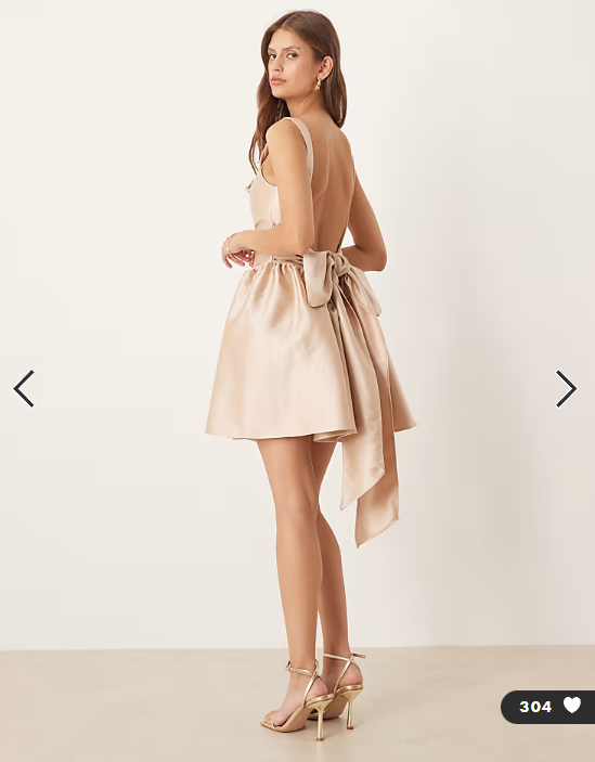 Six Stories drop hem bow back mini dress in soft gold
