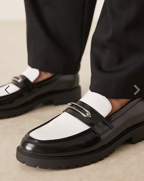 ASOS DESIGN loafers in black and white with gold snaffle on cleated sole