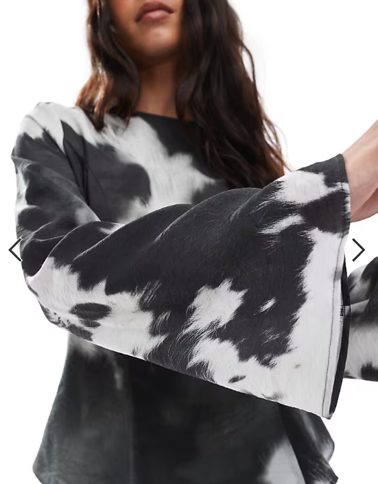 ASOS DESIGN smocked waist detail long sleeve top in cow print