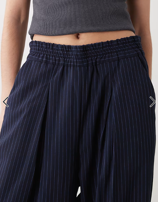 COLLUSION pull on trouser in navy pinstripe