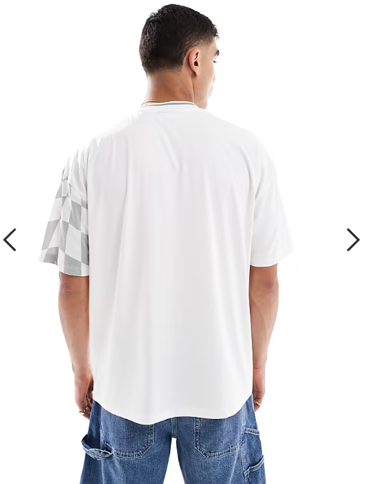 ASOS DESIGN oversized T-shirt with high build sports graphic in printed sports fabric .
