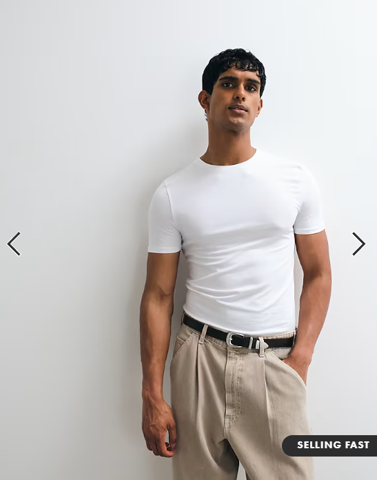 ASOS DESIGN essentials muscle fit T-shirt in white.