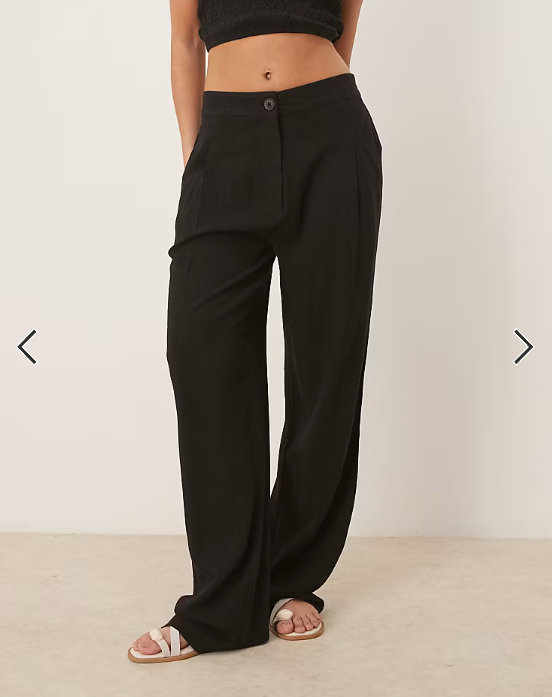 ASOS DESIGN pleat front tapered pants with linen in black
