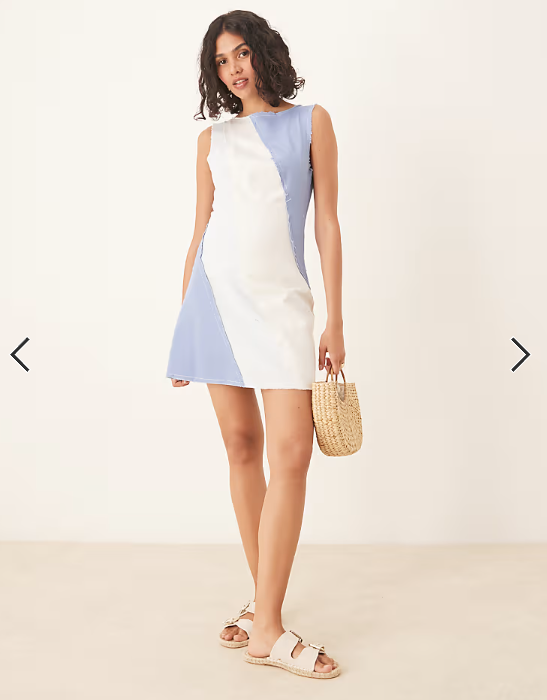 ASOS DESIGN mini aline contrast panel denim-look mini with raw hem in blue
