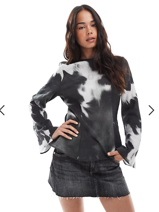ASOS DESIGN smocked waist detail long sleeve top in cow print