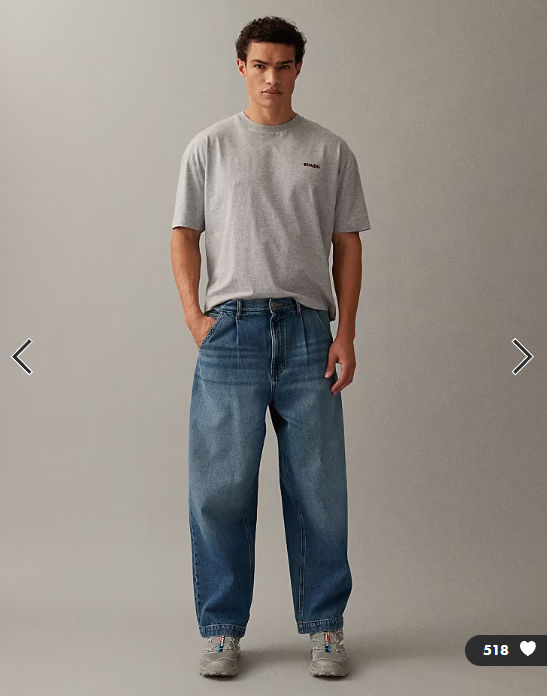 ASOS DESIGN relaxed tapered jeans in mid wash blue with pleats