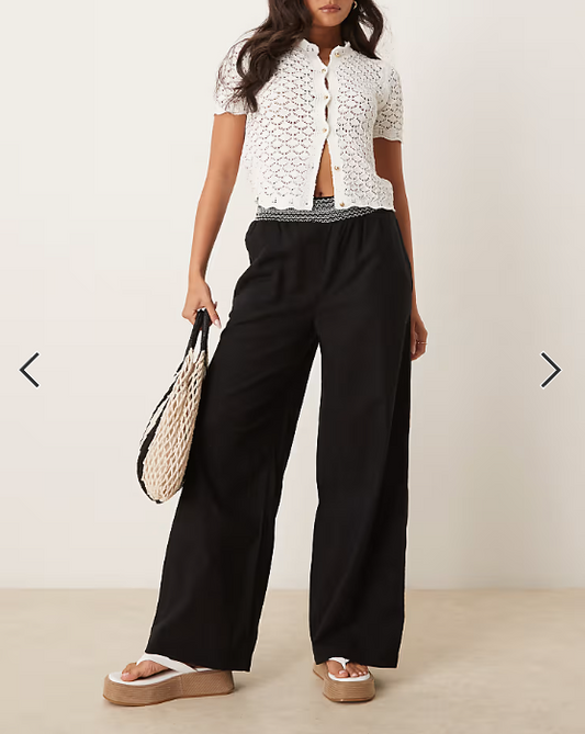 ASOS DESIGN linen blend pull on wide leg pants with shirred waist detail in black with cream trim