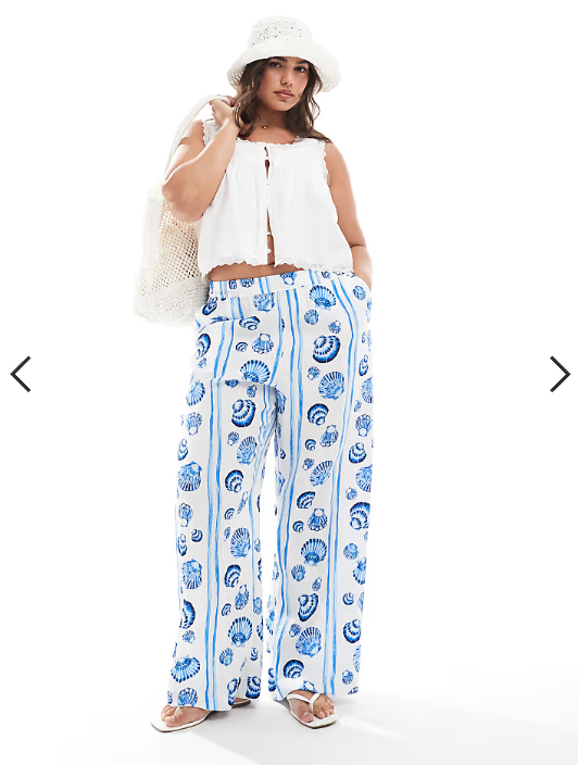 Vero Moda Curve wide leg trousers in blue seashell print