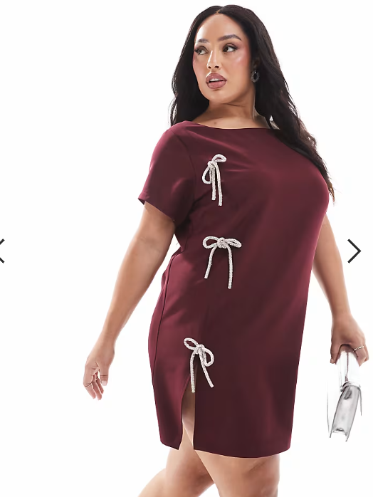 Renee Studio Plus x Michelle Nayla exclusive embellished bow detail side split mini dress in burgundy