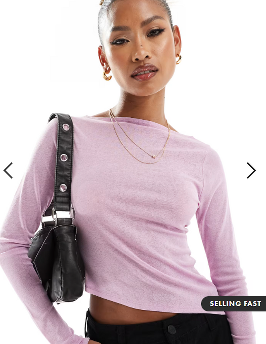ASOS DESIGN sheer long sleeve top with asymmetric hem in pink