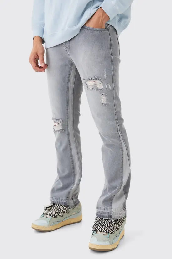boohooMAN Slim Flare Distressed Gusset Panel Jeans