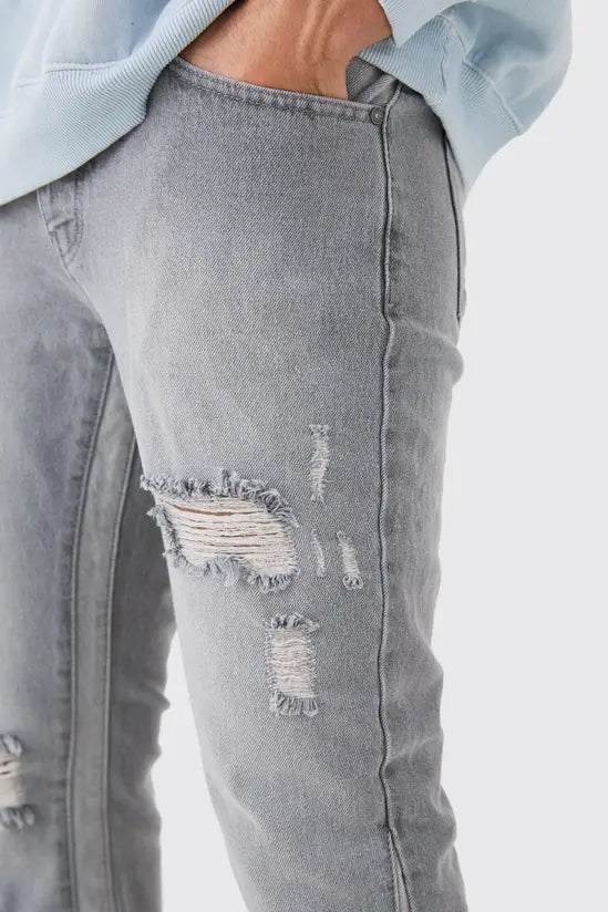 boohooMAN Slim Flare Distressed Gusset Panel Jeans