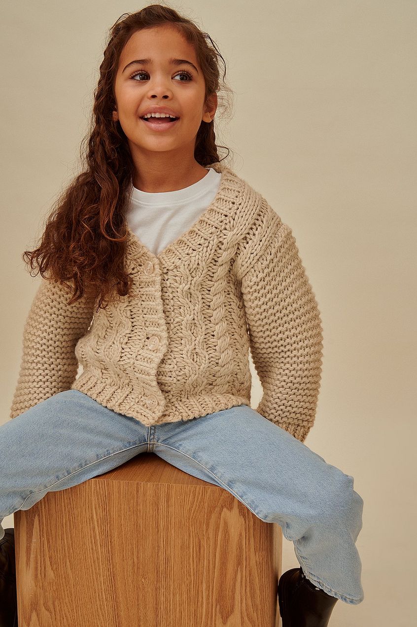 Cable knitted mini cardigan