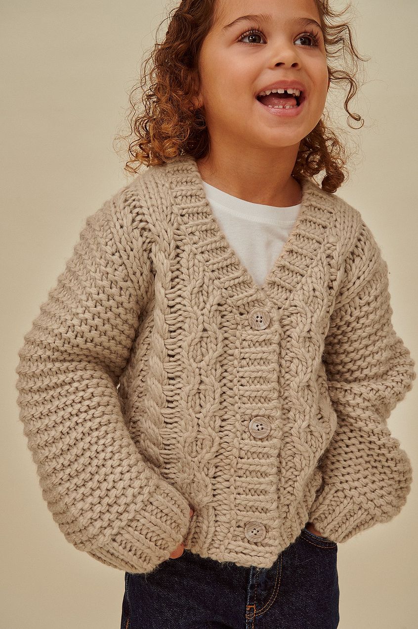 Cable knitted mini cardigan