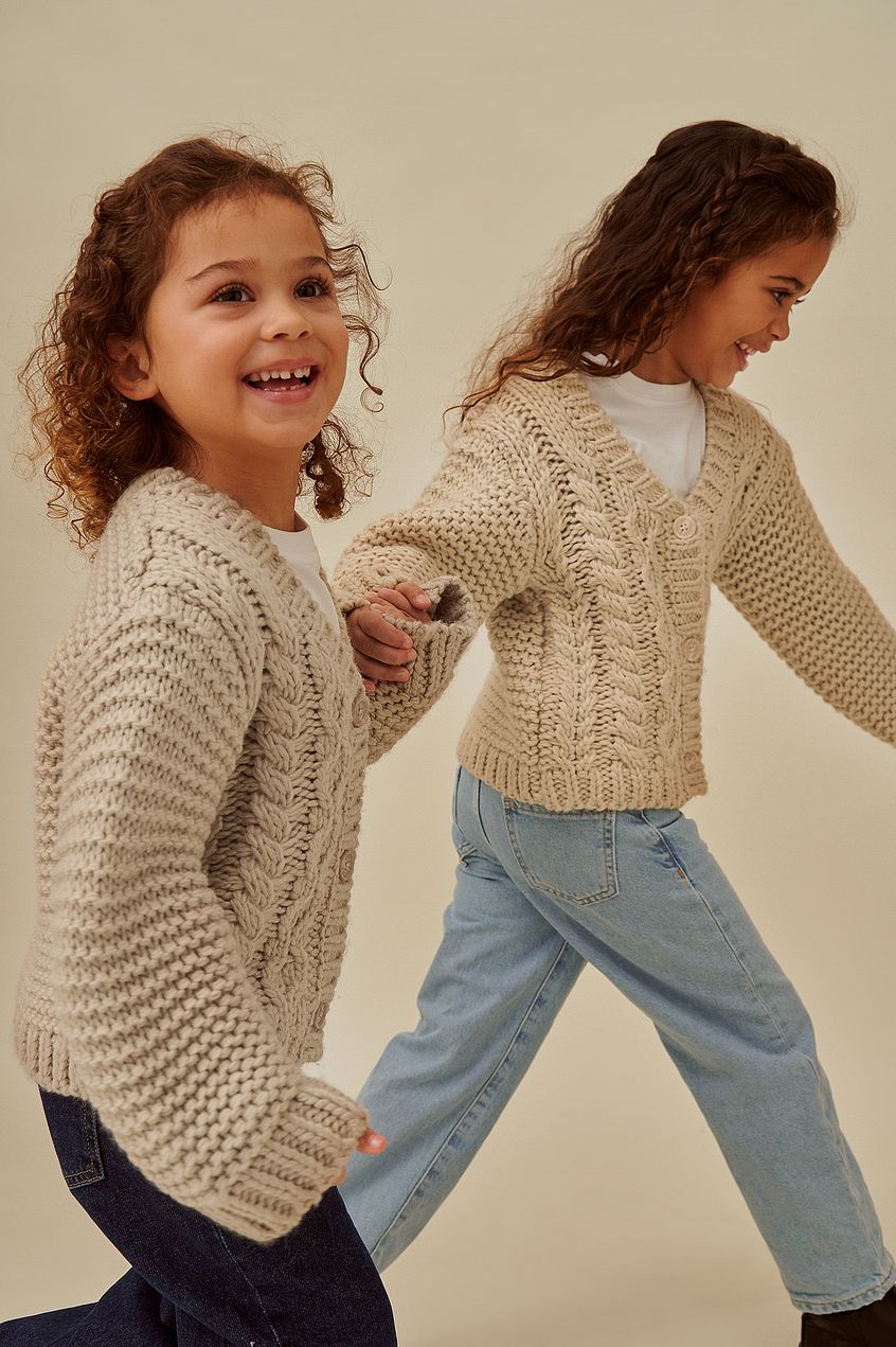 Cable knitted mini cardigan